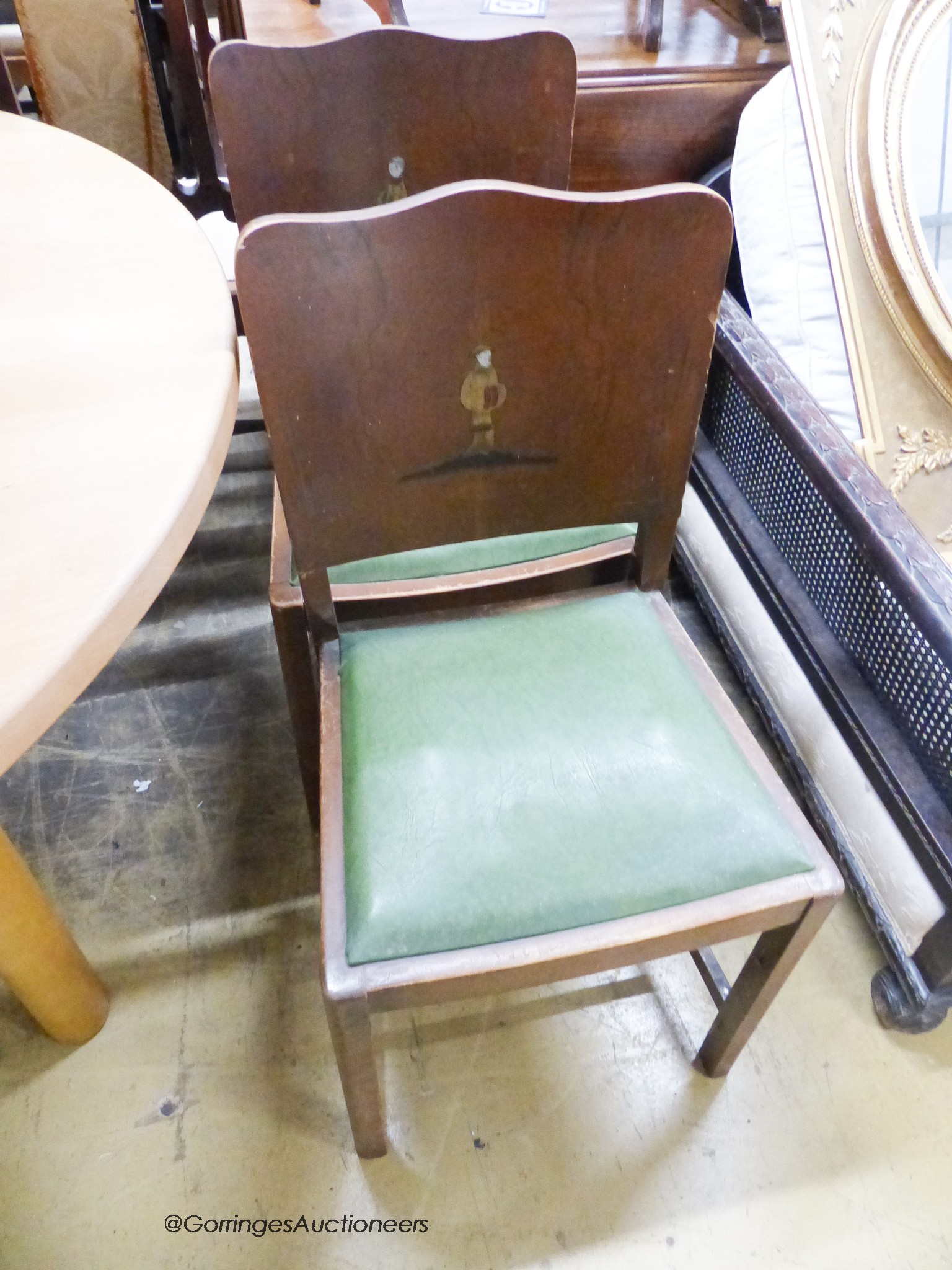 A set of four 1920's chinoiserie lacquer dining chairs